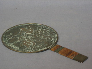 An Eastern bronze hand mirror 9"