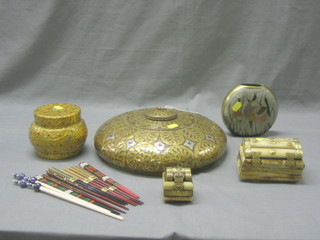 A large circular Eastern wooden bowl with pierced metal cladding 12", 1 other Eastern jar and cover, 3 horn trinket boxes, an Indian metal vase and a collection of chop sticks