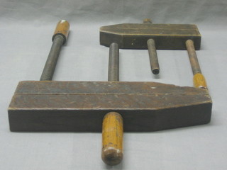 2 large wooden carpenter's clamps