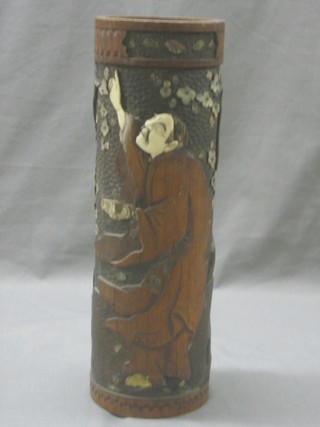A 19th Century Oriental carved bamboo vase, inlaid mother of pearl and ivory, in the form of a standing gentleman 15" (f)
