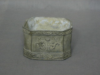 A lead lozenge shaped tobacco jar (no lid) decorated fleur de lis 4"