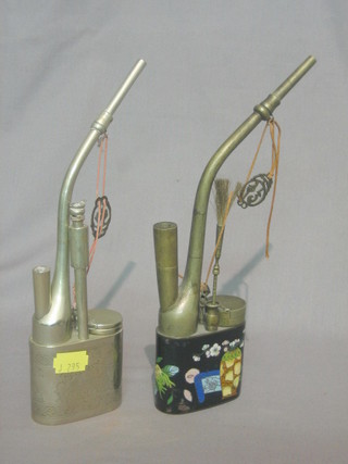 An Eastern cloisonne enamelled opium pipe and a metal opium pipe