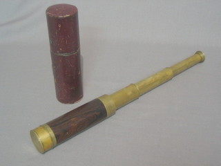 A Victorian 3 draw pocket telescope contained in a mahogany and brass case (chip to lens) complete with original cardboard carrying case