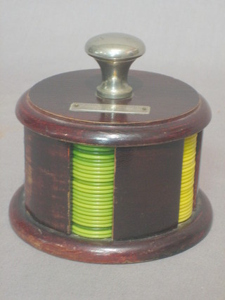 A circular Art Deco oak and silver mounted gaming counter holder with numerous gaming chips