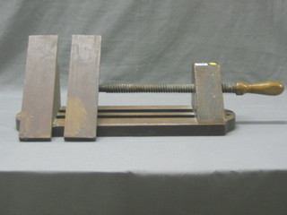 A large wooden carpenter's vice marked J Cross 20"