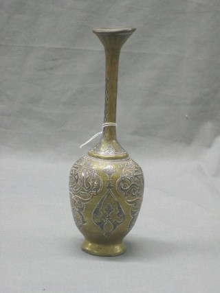 An Indian brass club shaped vase with applied silver decoration 10"