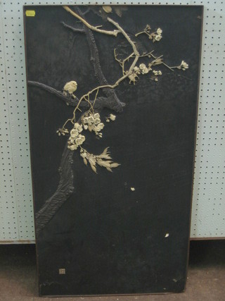 An Oriental lacquered and inlaid ivory panel depicting a bird amidst branch 36" x 19"