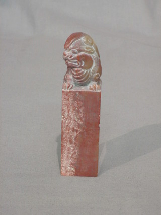 An Eastern hardstone seal decorated a dog of fo 4 1/2"