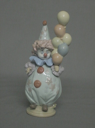 A Lladro figure of a standing sad clown, the base impressed 5811 7"