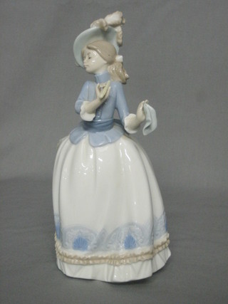 A standing Nao figure of a lady with fan 8"
