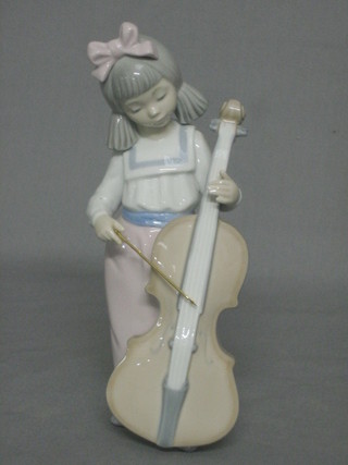 A Nao figure of a standing girl with cello 7"
