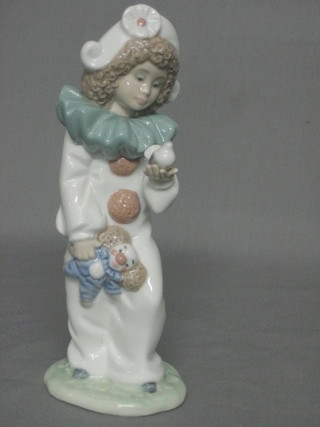A Nao figure of a standing girl clown with dove 8"