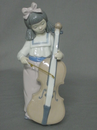 A Nao figure of a standing girl cellist 7"