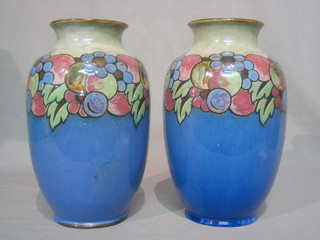 A pair of  Royal Doulton stoneware vases with applied fruit decoration, bases incised NB and impressed 86878 13" (slight chip to base)