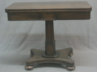 A William IV rosewood D shaped card table, raised on a triform base with bun feet 36" (missing 1 castor)