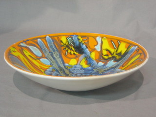 A Poole Pottery Atomic orange bowl the base with Poole and dolphin mark 57, 11"