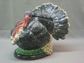 A 1920's  tureen in the form of a seated Turkey by Ault (slight crack to back) 16"