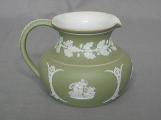 A 19th Century Wedgwood green Jasperware jug with classical oak leaf decoration 5"