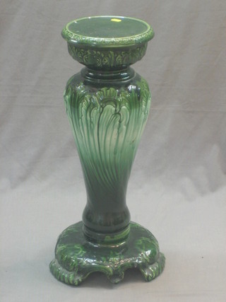 A green glazed pottery jardiniere stand 24"