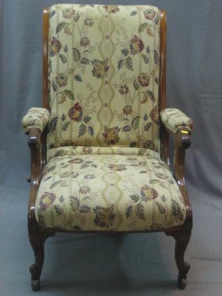 A Victorian mahogany show frame reclining arm chair