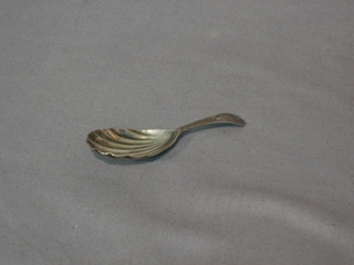 A George IV silver caddy spoon with bright cut handle and shell bowl, London 1828