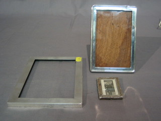 A plain silver easel photograph frame 6" x 5", 1 other (f) 8" x 5" and 1 other 3" x 2"