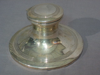 A circular silver capstan inkwell, Birmingham 1924 6"