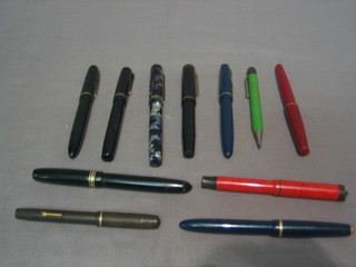 A small collection of various pens