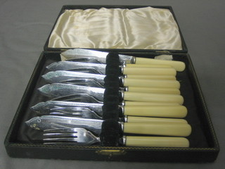 A set of 6 fish knives and forks, cased