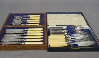 2 sets of silver plated fish knives, cased