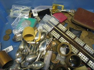 A collection of various coins, flatware etc