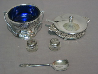 2 circular cut glass rouge pots with silver lids, a plated sugar bowl with blue glass liner and a circular twin handled butter dish