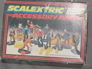 A boxed set of Scalextrix figures