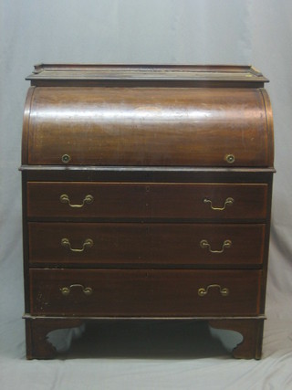 An Edwardian inlaid mahogany cylinder bureau, the fall revealing a well fitted interior above 3 long drawers, raised on bracket feet 36"