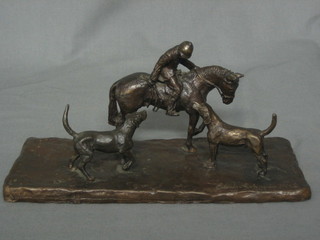 Elizabeth Jackson MVO, a bronze figure of Huntsman with 2 hounds 9", dated 1976