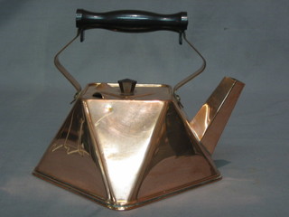 An Art Nouveau square shaped copper kettle with Bakelite handle