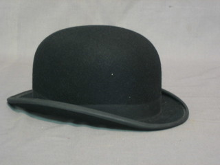 A gentleman's bowler hat by Lock, approx size 7