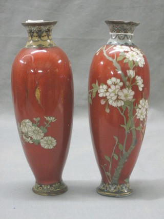 A pair of 19th Century Japanese red ground and floral patterned cloisonne vases 9" (1 f)