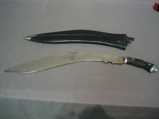 A reproduction Kukri complete with scabbard and 2 skinning knives