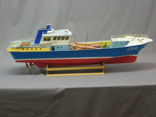 A fibre glass model of a fishing boat Polar E650, 36"