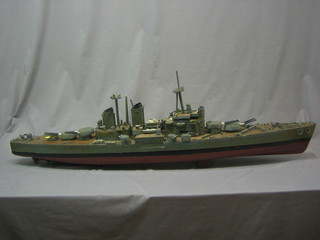 A wooden model of a war ship 49"