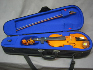 A childs three-quarter violin, the Stenlor Student One, complete with bow