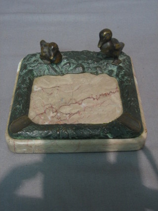 An Art Deco pink marble and bronze ashtray in the form of a pond with 2 standing ducks 5"