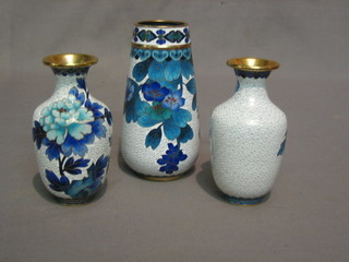 A floral patterned cloisonne vase 7" and 2 others 5"