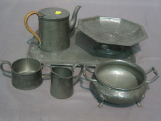 A planished pewter tray 12", a George Phillips octagonal pewter bowl 8", a 3 piece Civic pewter tea service and a twin handled pewter vase