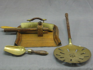 A  pierced brass cream skimmer, a table brush and tray, a mortice gauge and a small brass handled grain measure