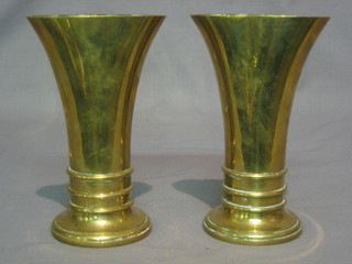 A pair of Art Nouveau waisted brass vases by Wippell & Co London and Exeter 7"