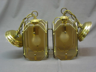 A pair of Dutch 3 light electroliers and 2 hanging lanterns