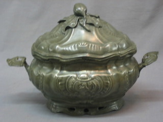 An 18th Century Austrian pewter twin handled tureen with armorial decoration 14" (handle f and r)
