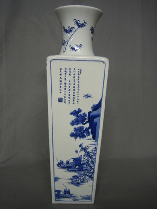 An 18th Century square blue and white Oriental porcelain vase decorated figures amidst landscape with with numerous characters 22"